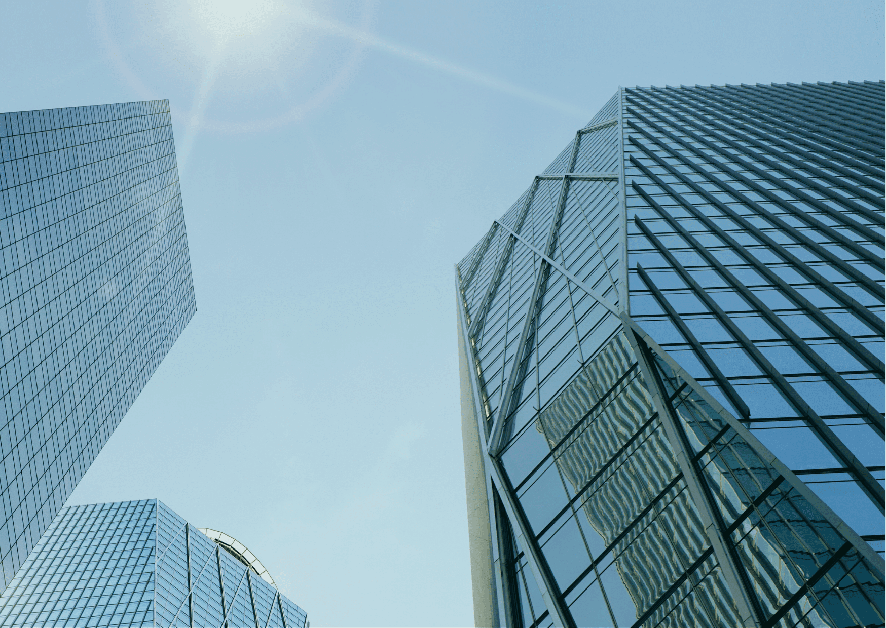 Corporate office buildings representing how large organisations can impact software developer growth and career progression